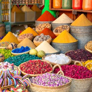 Colorful spices and dyes found at souk market in Marrakesh, Morocco.